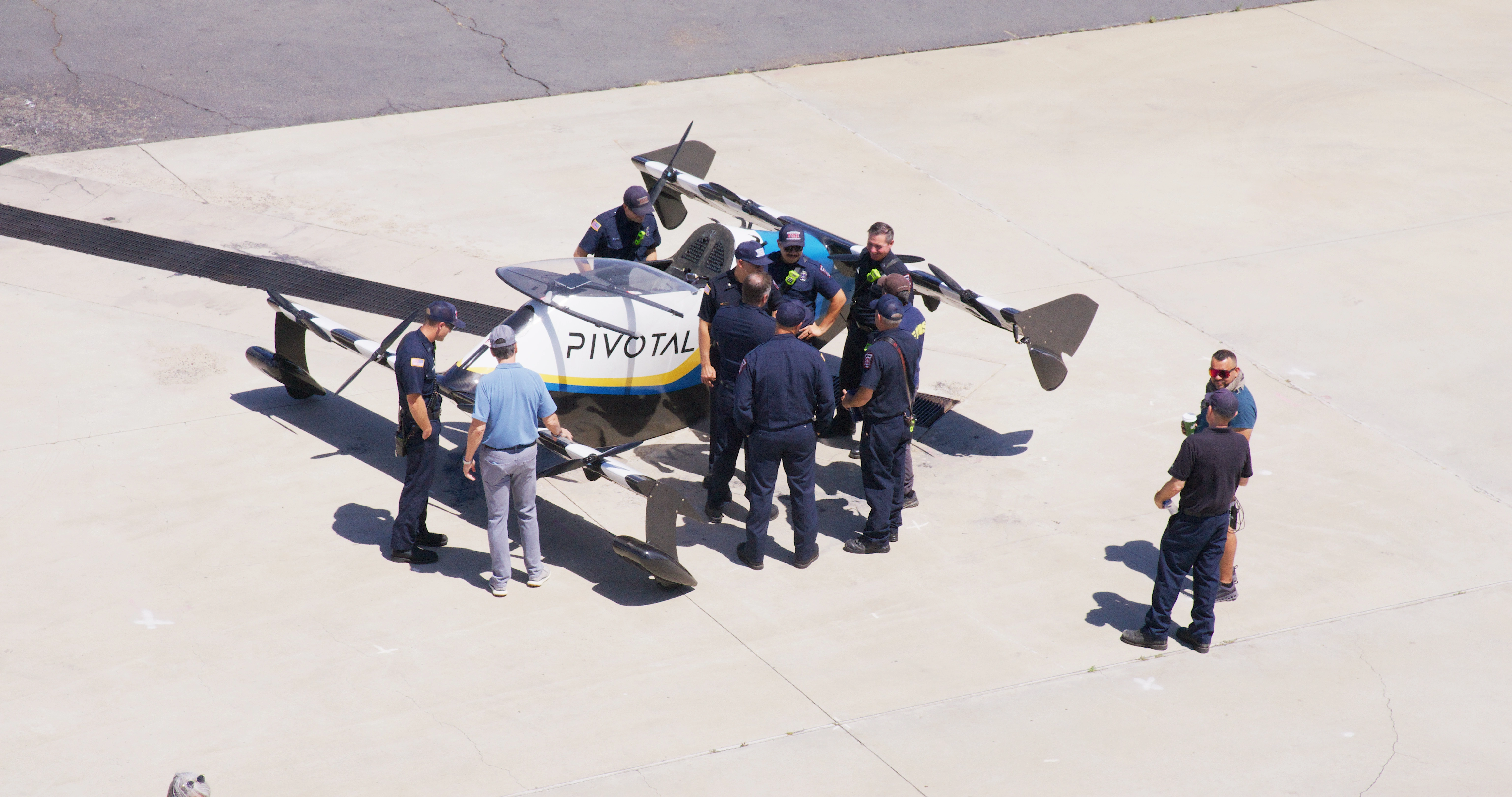 EMS standing around a Pivotal aircraft